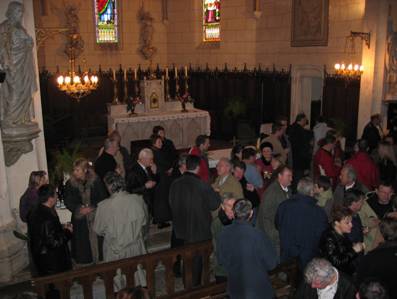 Crowd near the altar of the church